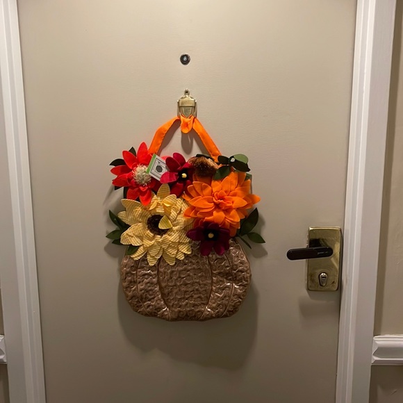 Evergreen Other - Evergreen Door Decor. Gold “vase” with vibrant flowers.